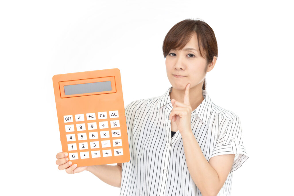 計算機を持っている母親の画像